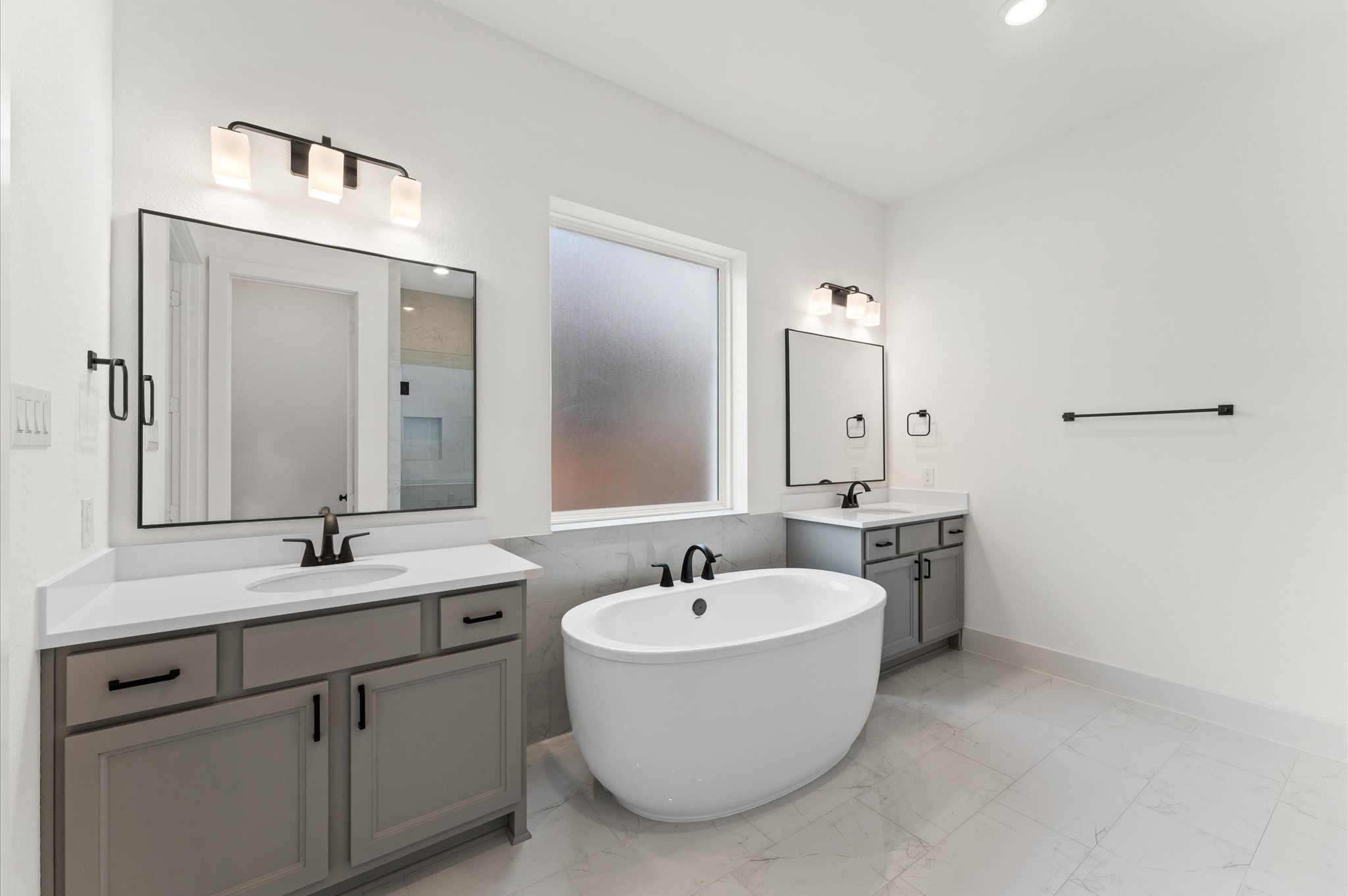 8218 Sherman Pk Trail Spring, TX 77389 - Photo 13 of 28 a bathroom with a sink and a mirror