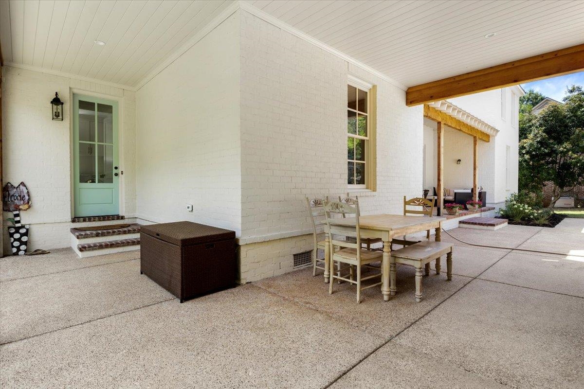 350 Burrows Road Collierville, TN 38017 - Photo 8 of 36 a living room with furniture a table and chairs in it