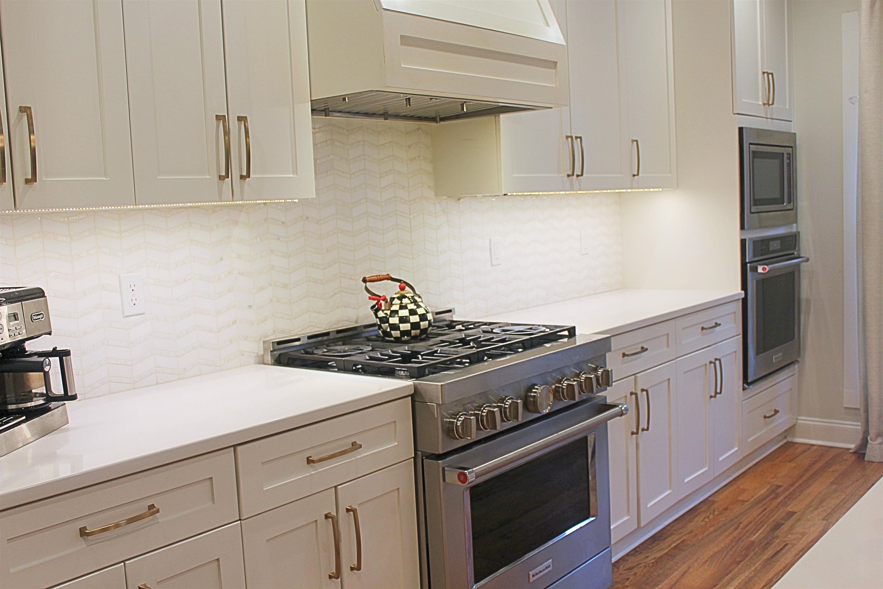 350 Burrows Road Collierville, TN 38017 - Photo 10 of 36 a white stove top oven sitting inside of a kitchen