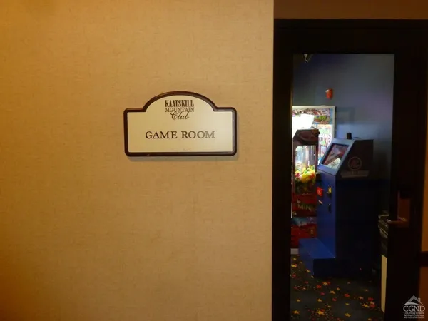 a living room with furniture and flowers