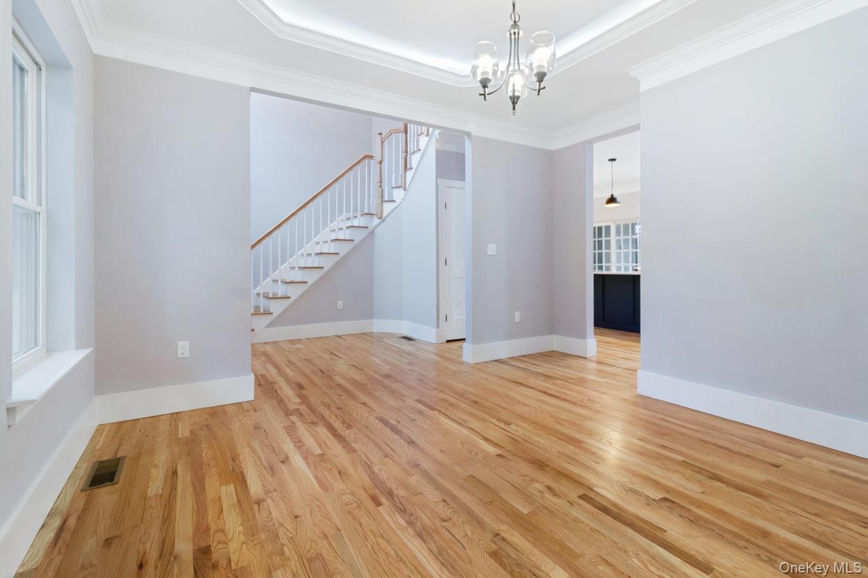 800 Sleepy Hollow Road Briarcliff Manor, NY 10510 - Photo 13 of 15 a view of empty room with wooden floor and fan