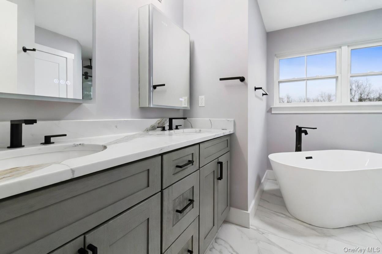 800 Sleepy Hollow Road Briarcliff Manor, NY 10510 - Photo 10 of 15 a bathroom with a sink and a bathtub