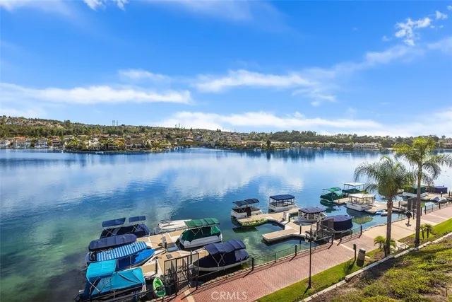 a view of a lake with houses with outdoor space