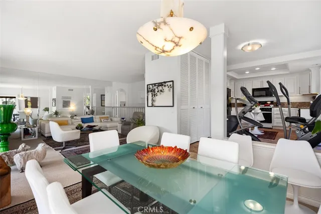 a living room with lots of furniture and decor