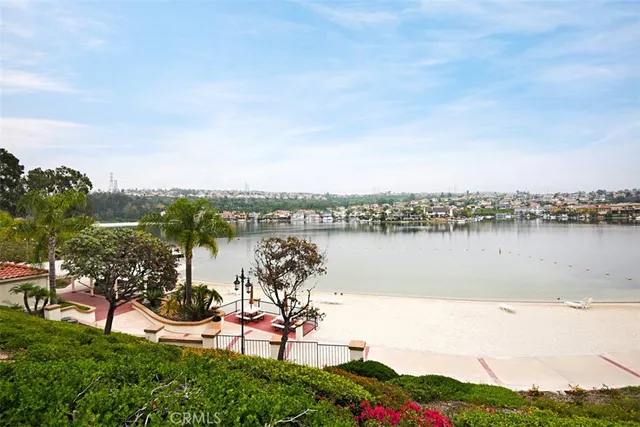 a view of a lake with a city