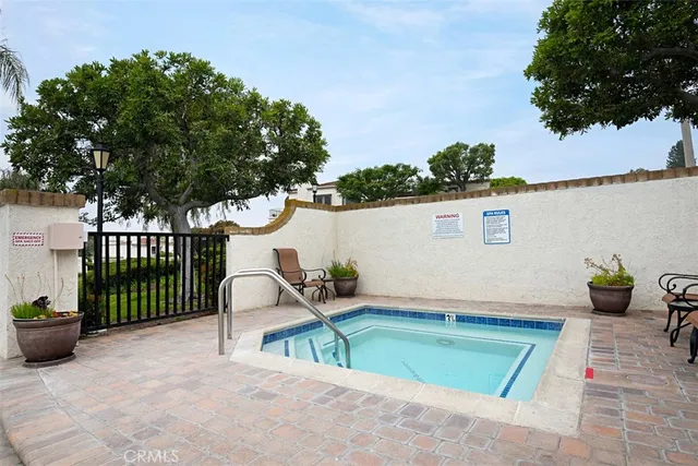 a house view with a backyard space