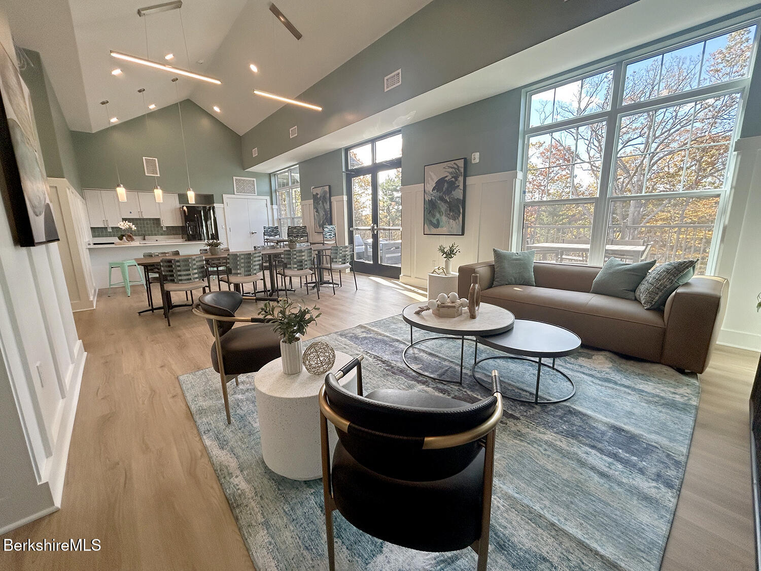 9 Brushwood Way, Unit 9 Lenox, MA 01240 - Photo 7 of 15 a living room with furniture and a large window