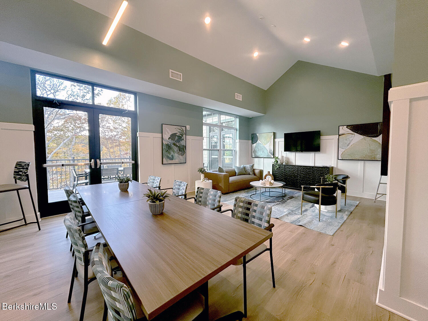 9 Brushwood Way, Unit 9 Lenox, MA 01240 - Photo 9 of 15 a view of a dining room with furniture window and wooden floor