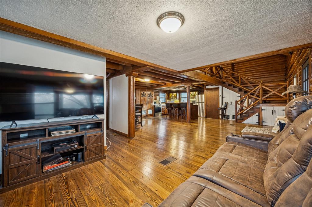 2821 Sachse Road Wylie, TX 75098 - Photo 12 of 38 a view of a livingroom with furniture and an empty room