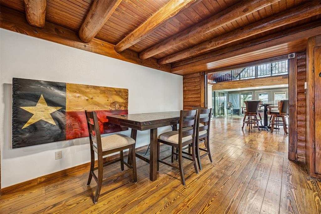 2821 Sachse Road Wylie, TX 75098 - Photo 16 of 38 a dining room with furniture and wooden floor