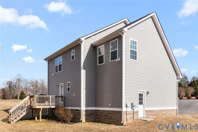 a front view of a house with a backyard