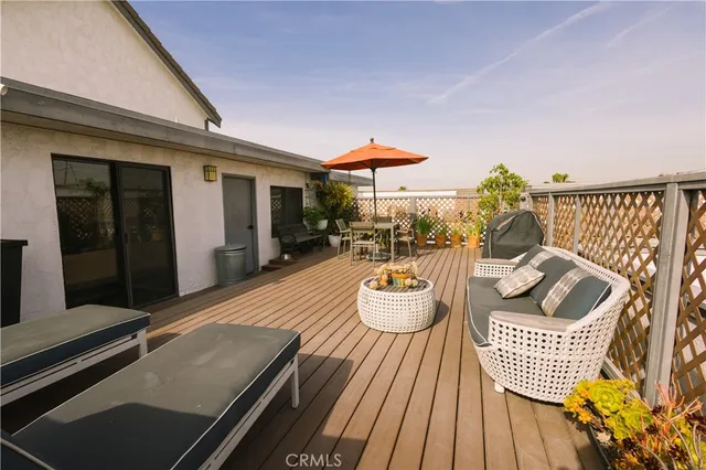 a outdoor space with patio fireplace and furniture