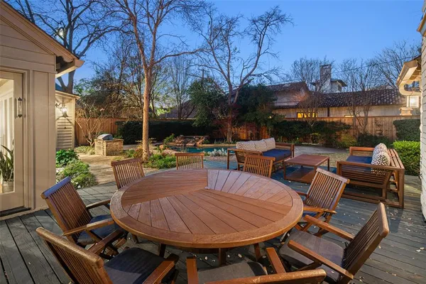 a view of a swimming pool with chairs