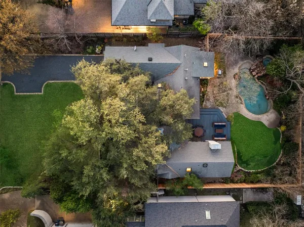 an aerial view of a house with a garden