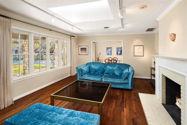 a living room with a couch and a fireplace