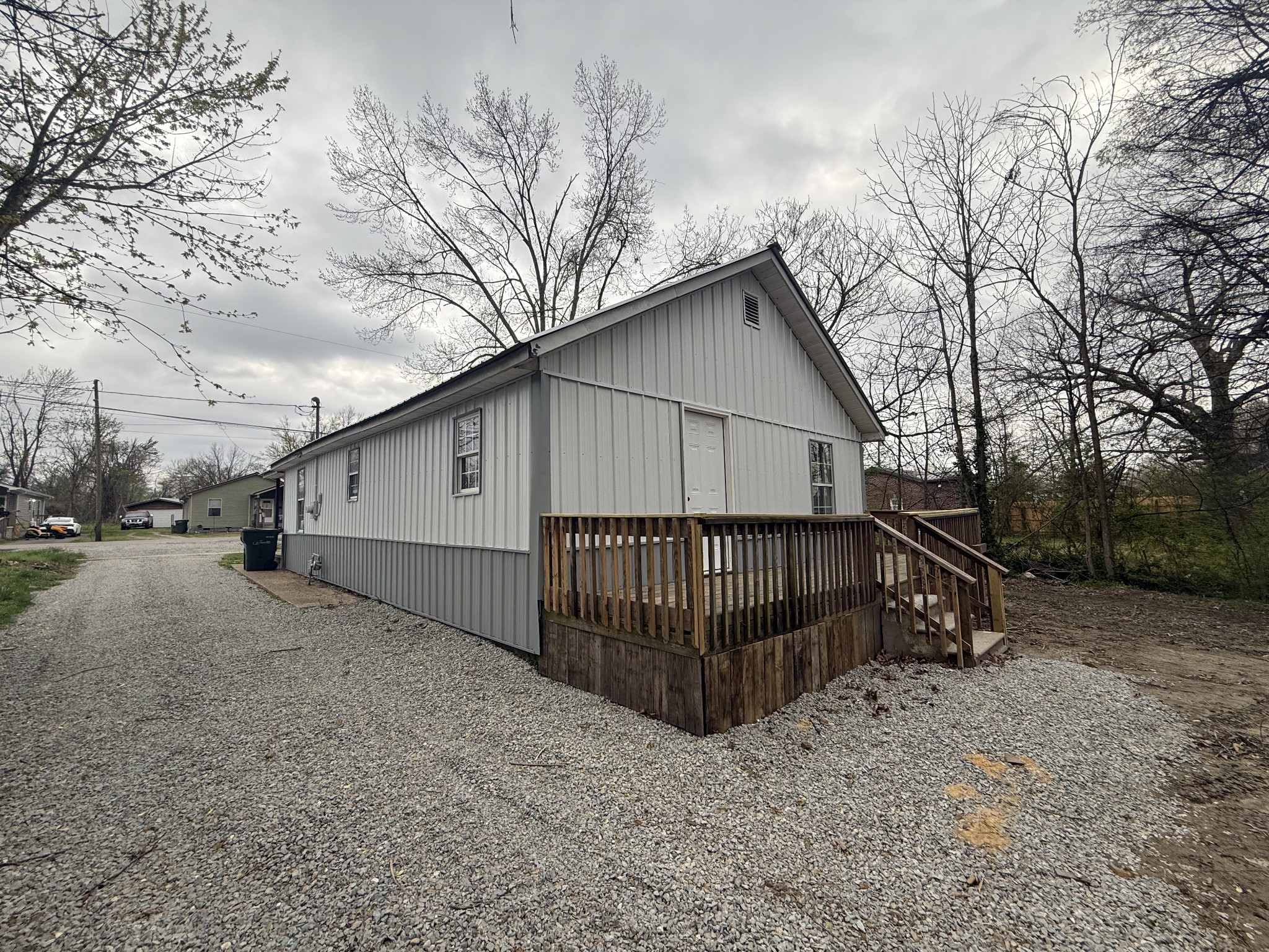 209 West 3rd Avenue Hohenwald, TN 38462 - Photo 3 of 12 a view of backyard of house