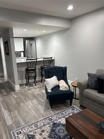 a living room with furniture and a table