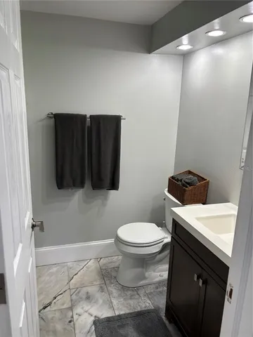 a bathroom with a sink and a toilet