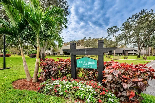 aerial view of a house with a garden