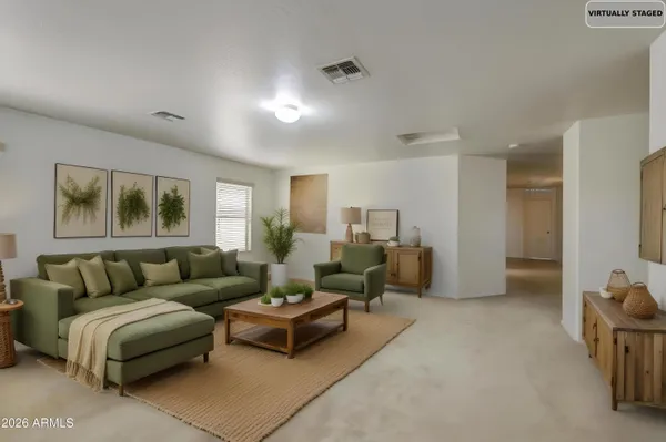 a living room with furniture and a window