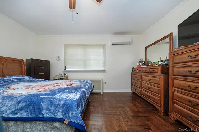 a bedroom with a bed and furniture