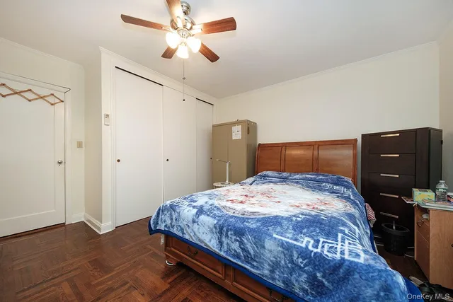 a bedroom with a bed and a closet