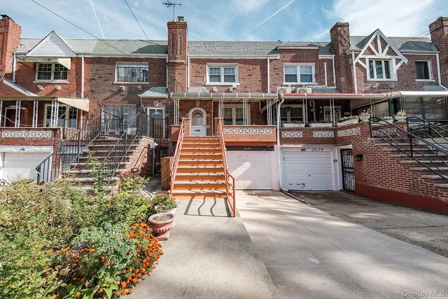 aerial view of a house with a yard