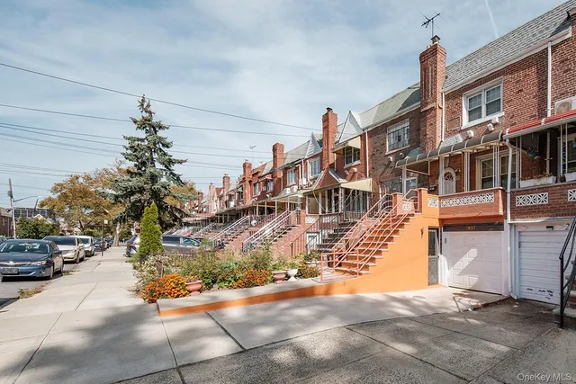 a view of a street with cars