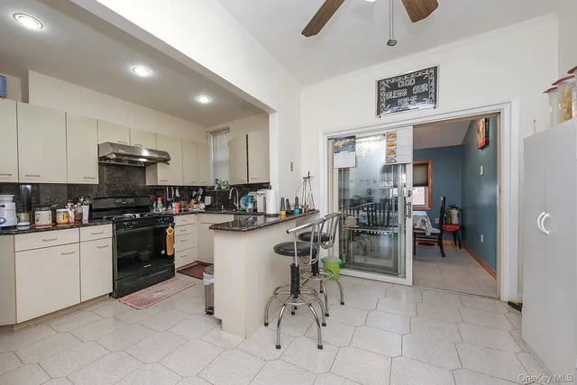 a kitchen with a sink cabinets and counter space