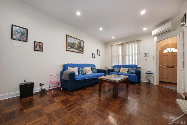 a living room with furniture and a table
