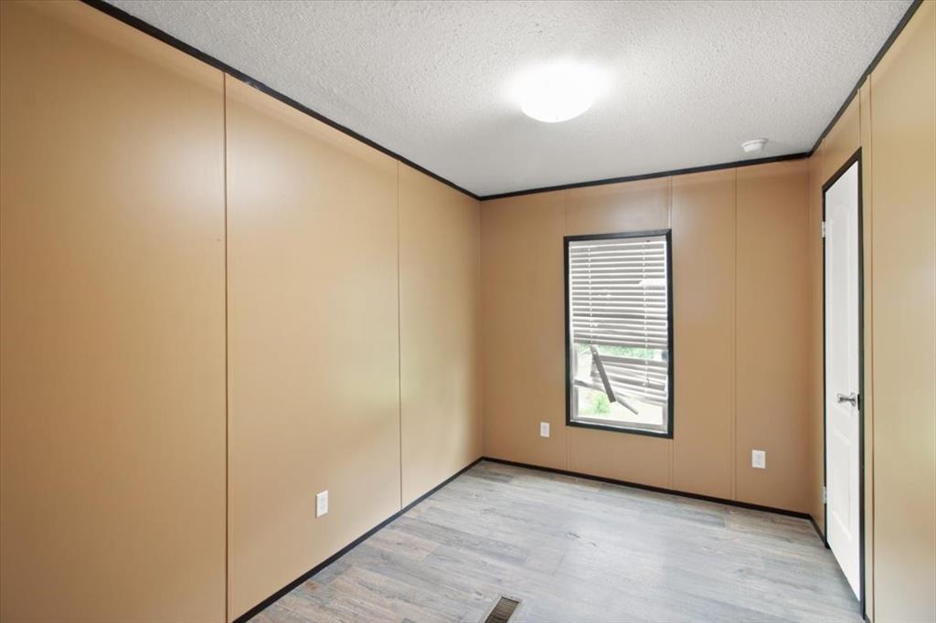 30 Galley Drive Denison, TX 75021 - Photo 14 of 18 a view of an empty room with a window