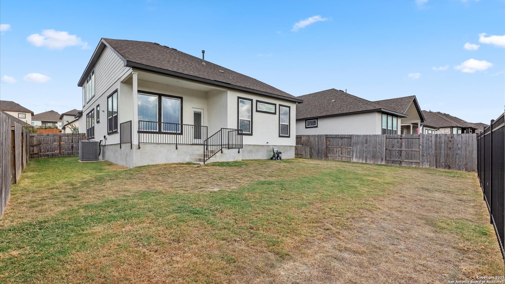 1551 Terrys Gate Road New Braunfels, TX 78132 - Photo 24 of 32 a view of a house with a yard