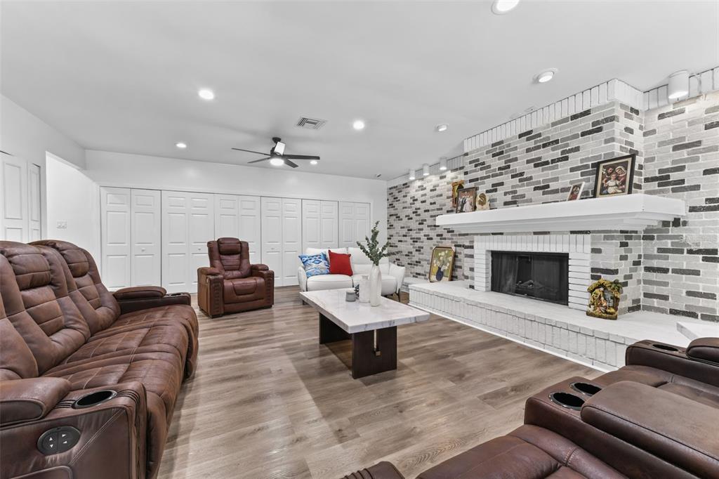 457 East Highland Street Altamonte Springs, FL 32701 - Photo 17 of 55 a living room with furniture and a fireplace
