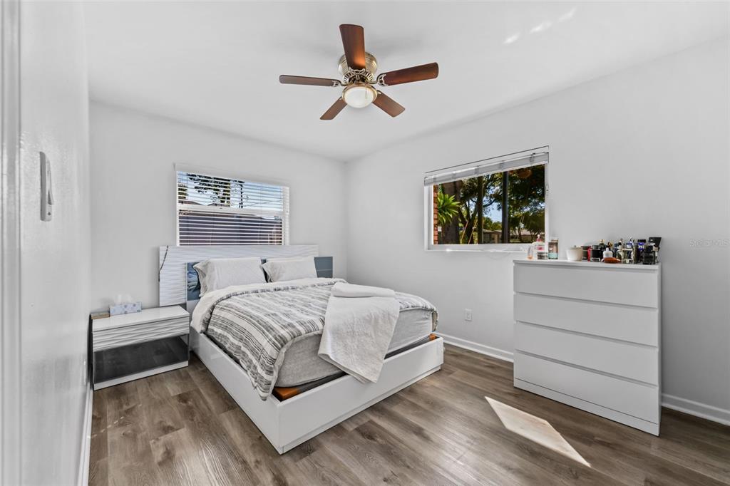 457 East Highland Street Altamonte Springs, FL 32701 - Photo 29 of 55 a bedroom with a bed and a window