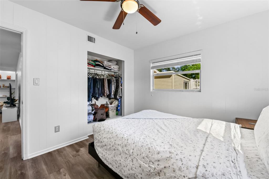 457 East Highland Street Altamonte Springs, FL 32701 - Photo 33 of 55 a bedroom with a bed and a dresser