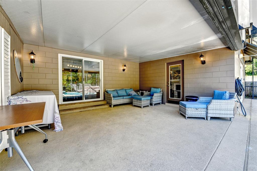 457 East Highland Street Altamonte Springs, FL 32701 - Photo 36 of 55 a bedroom with furniture and a large window