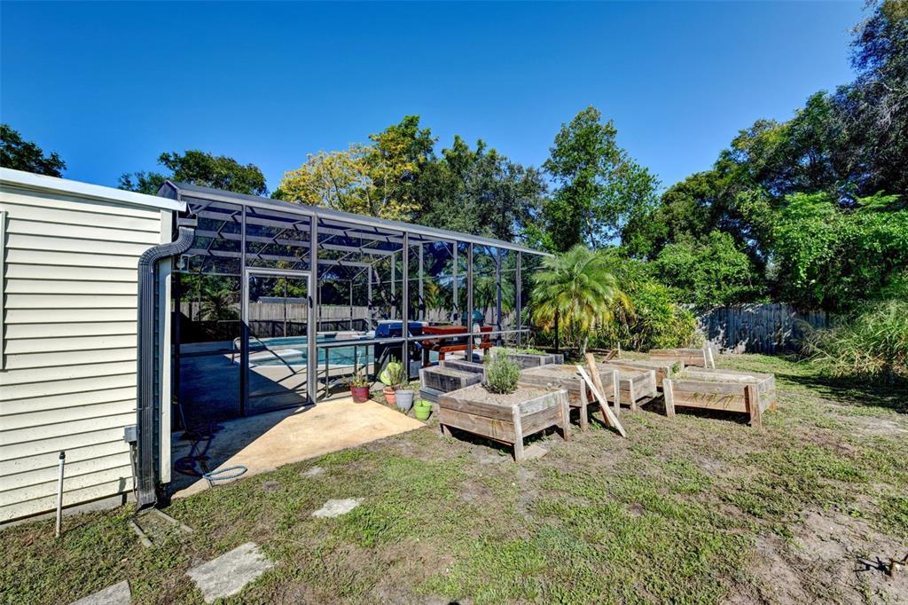 457 East Highland Street Altamonte Springs, FL 32701 - Photo 39 of 55 a view of a patio with chairs and potted plants