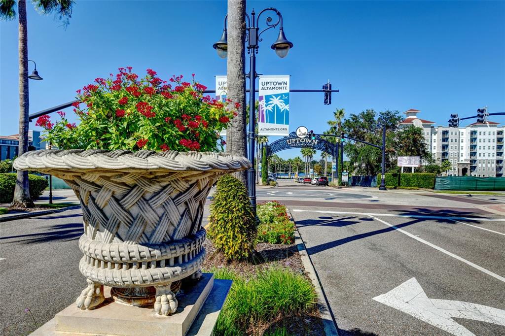 457 East Highland Street Altamonte Springs, FL 32701 - Photo 49 of 55 a view of a patio with table and chairs potted plants