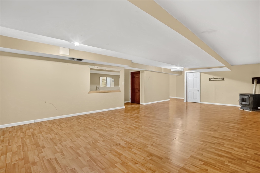 155 Brimfield Road Monson, MA 01057 - Photo 34 of 42 a view of empty room with wooden floor and fan