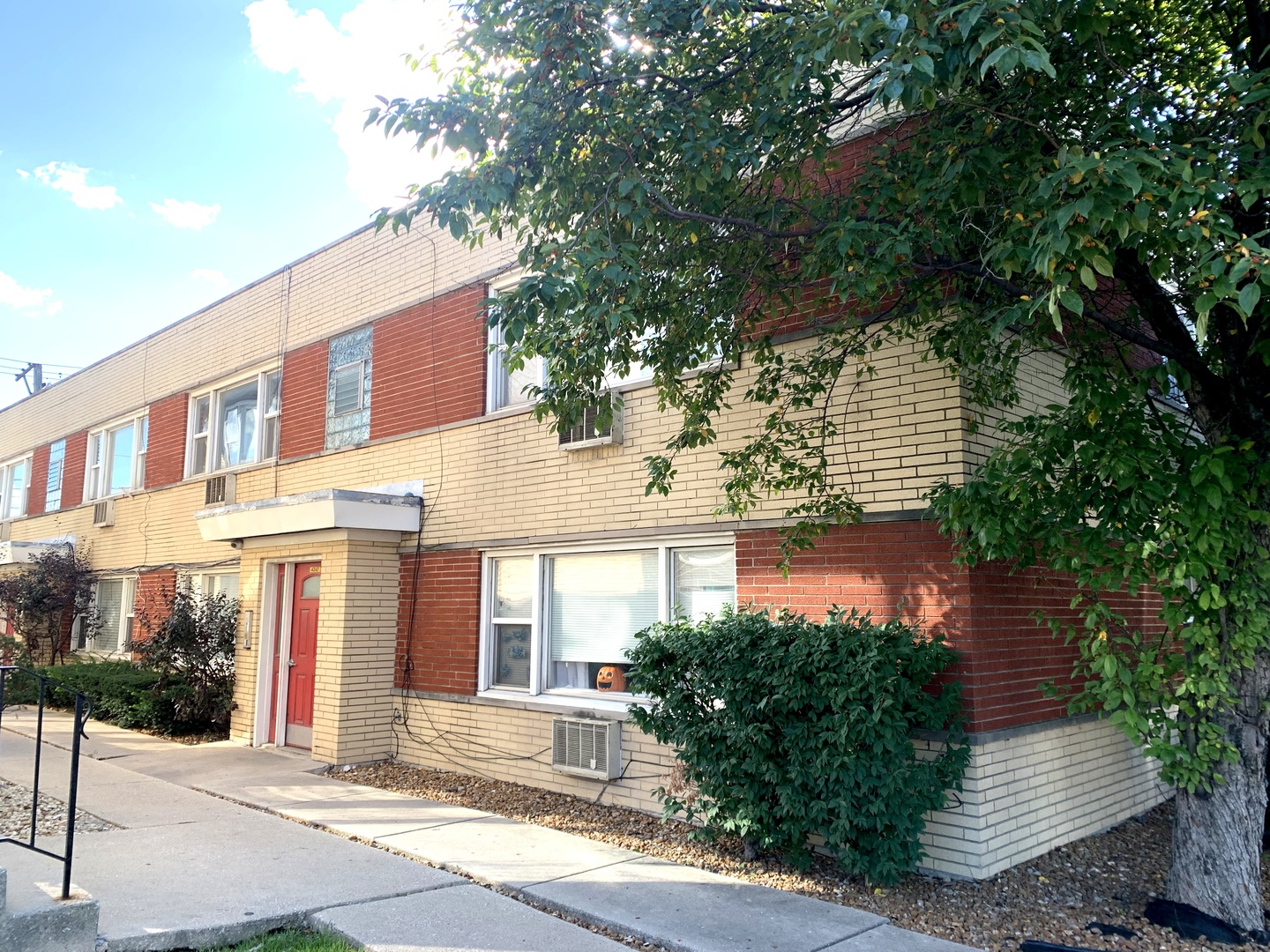 4347 West 63rd Street, Unit 2A Chicago, IL 60629 - Photo 15 of 15 a view of a building with tree s