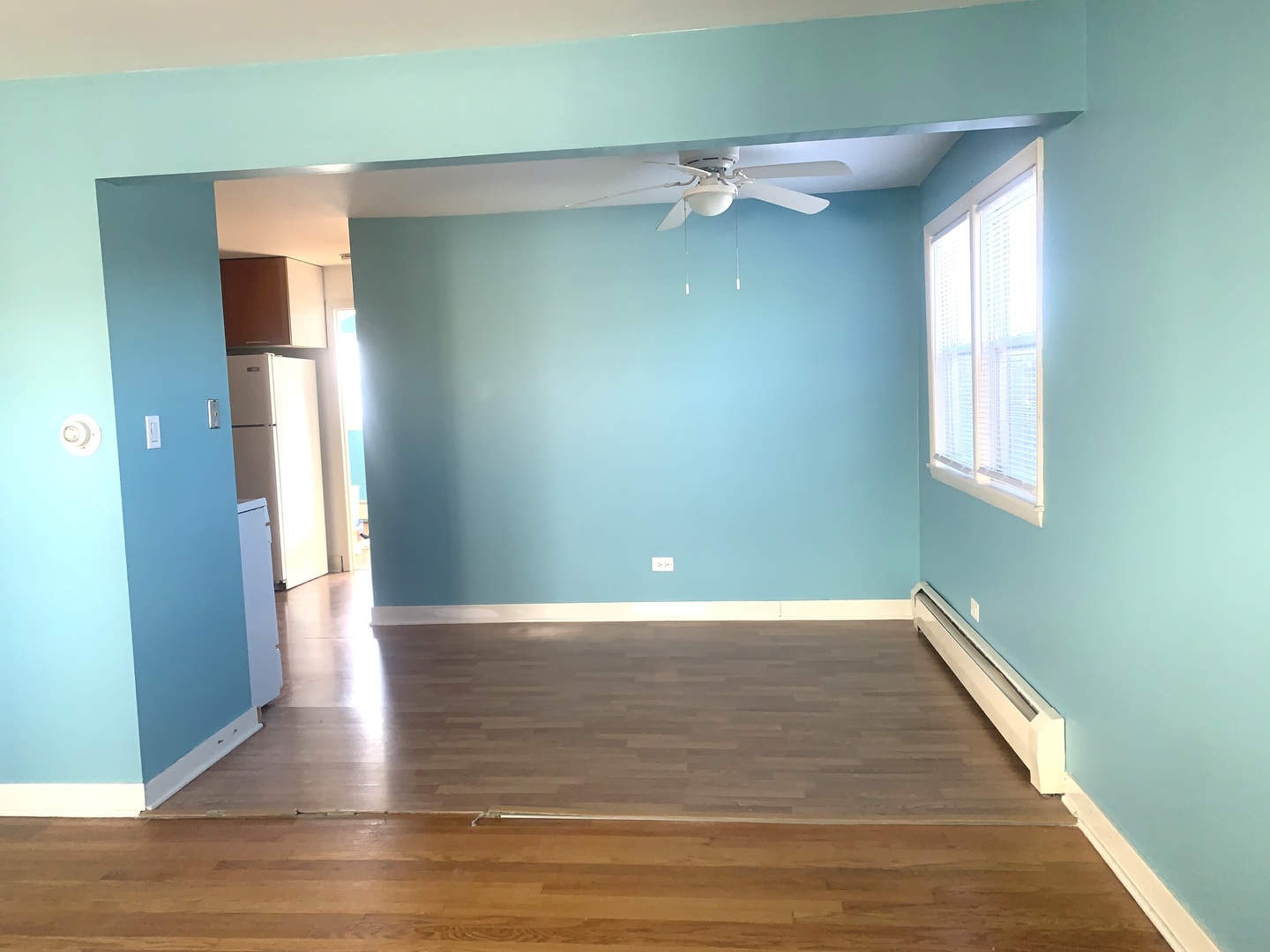 4347 West 63rd Street, Unit 2A Chicago, IL 60629 - Photo 5 of 15 a view of an empty room with wooden floor