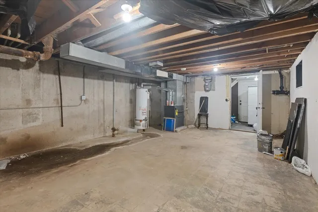 a view of a room with wooden walls