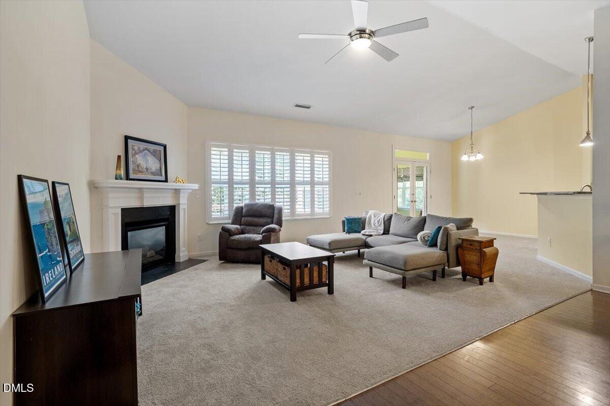115 Hidden Fox Path Garner, NC 27529 - Photo 2 of 20 Great room with cozy fireplace