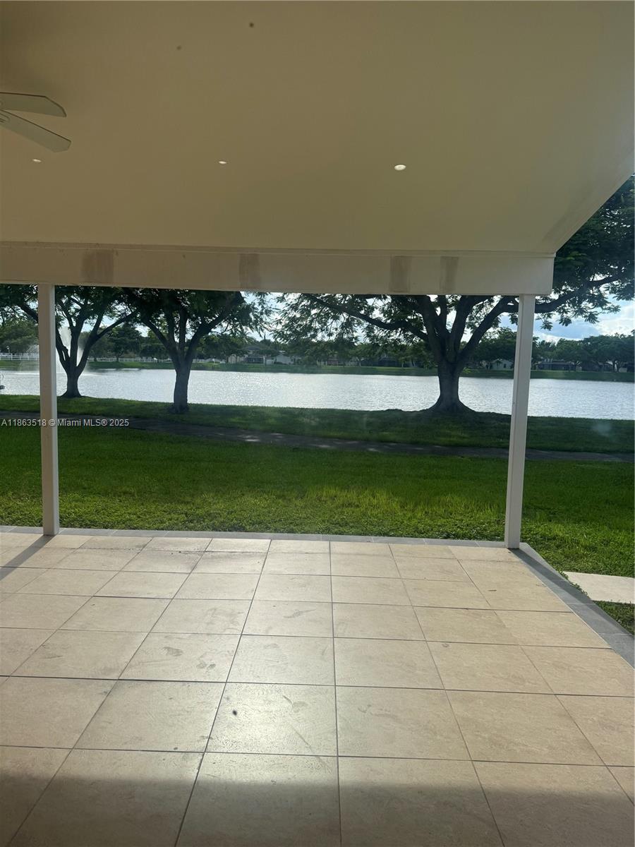 14570 Southwest 145th Place, Unit 14570 Miami, FL 33186 - Photo 16 of 23 a view of swimming pool with seating space