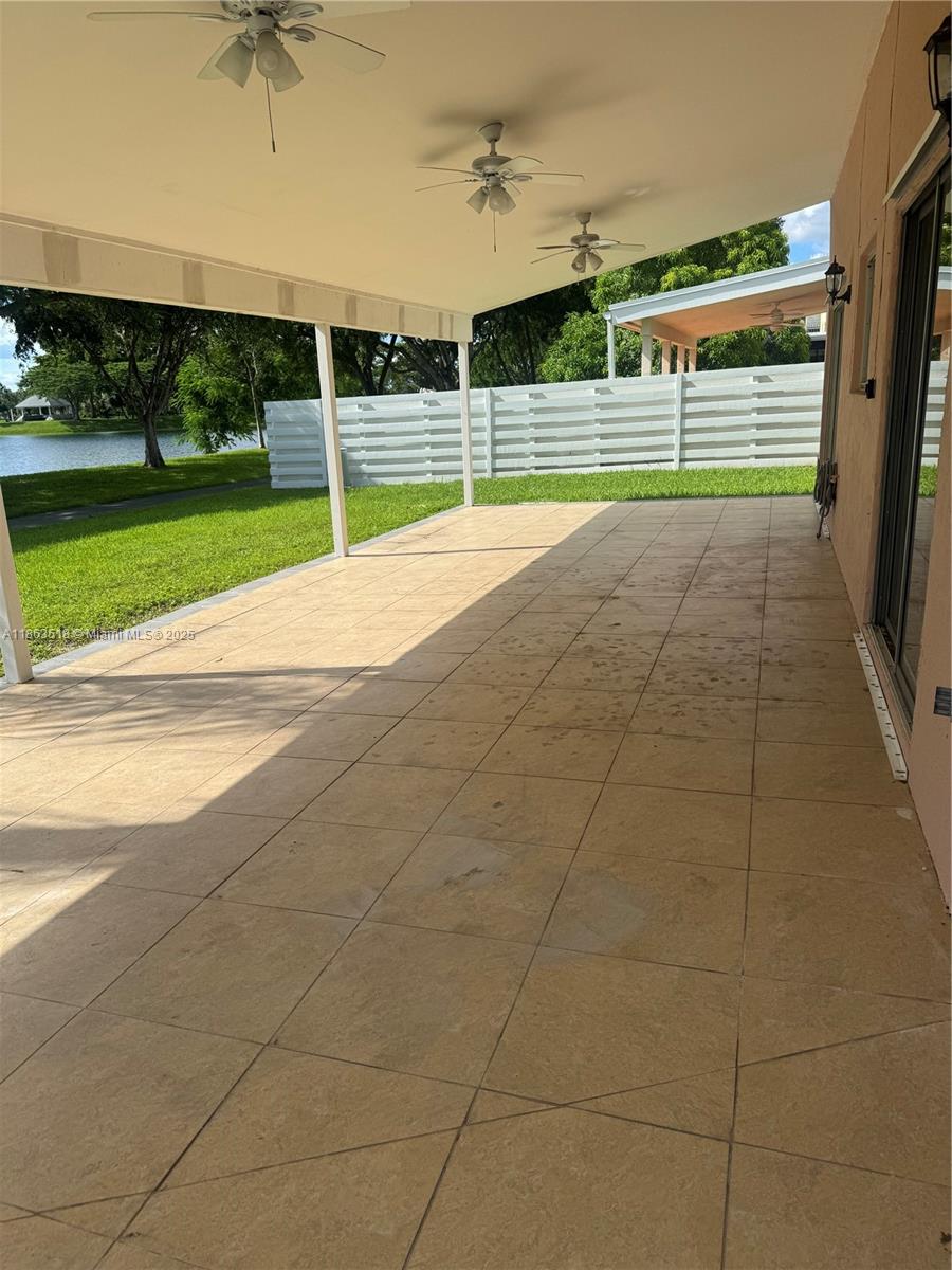 14570 Southwest 145th Place, Unit 14570 Miami, FL 33186 - Photo 19 of 23 a view of a backyard