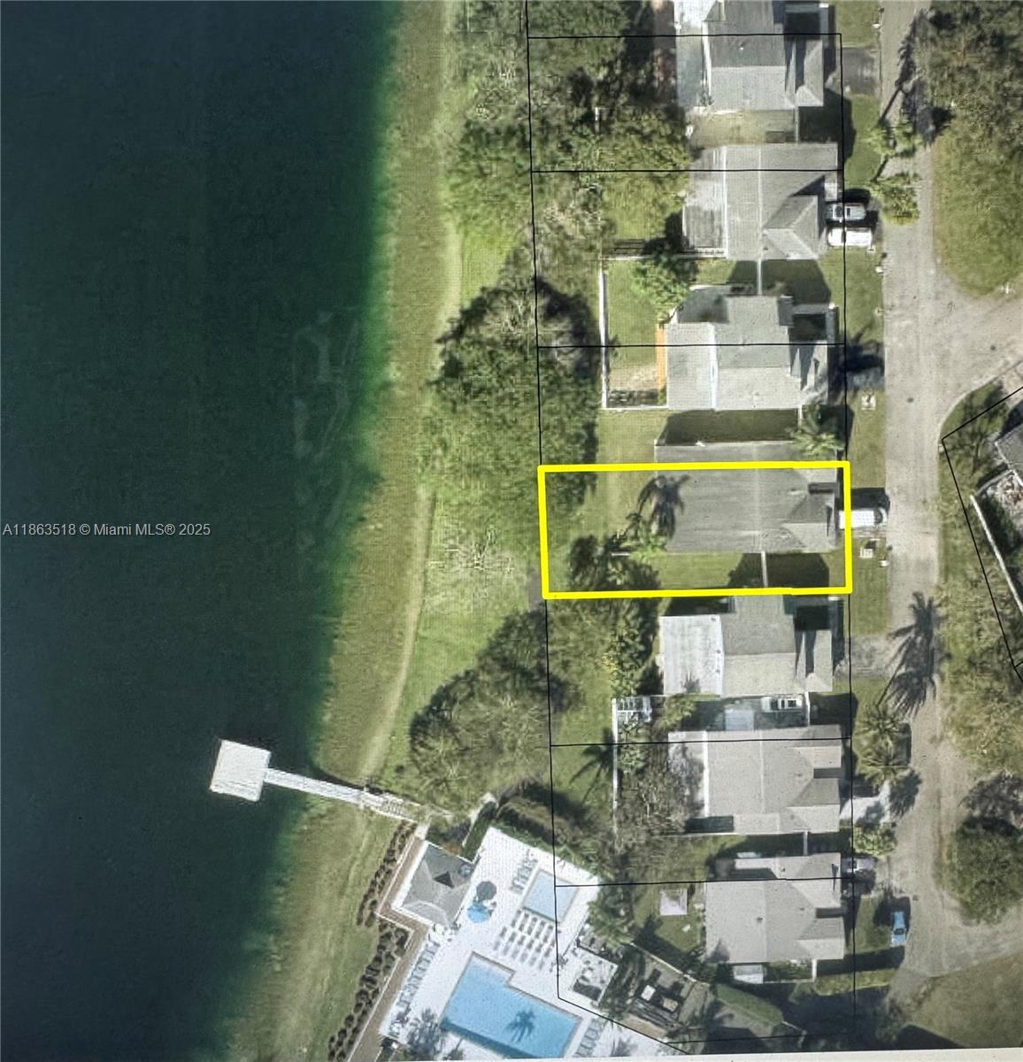 14570 Southwest 145th Place, Unit 14570 Miami, FL 33186 - Photo 23 of 23 an aerial view of a residential houses with outdoor space