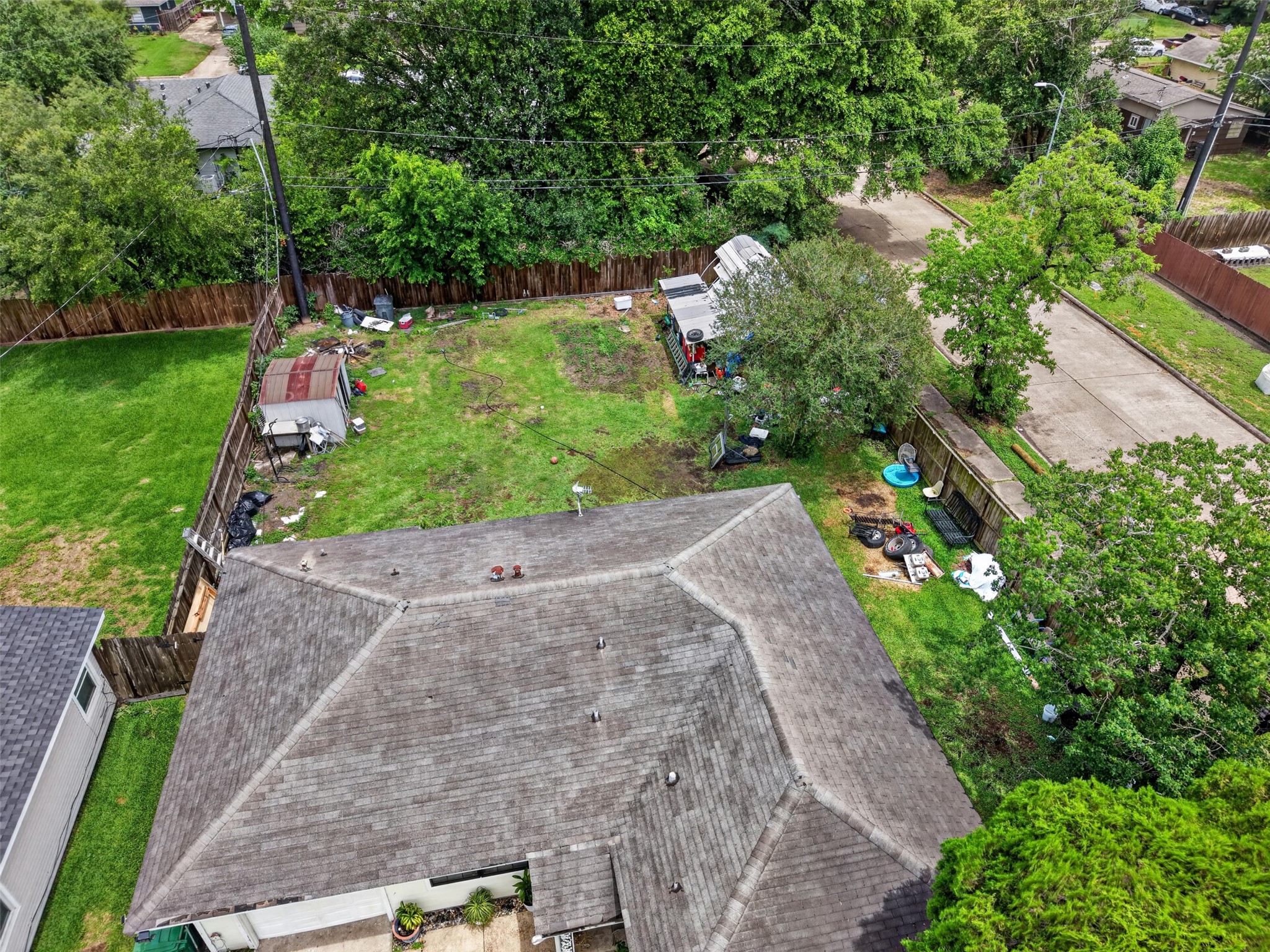 13919 Santa Teresa Road Houston, TX 77045 - Photo 18 of 22 Roof is Aged and does have some life / no leaking