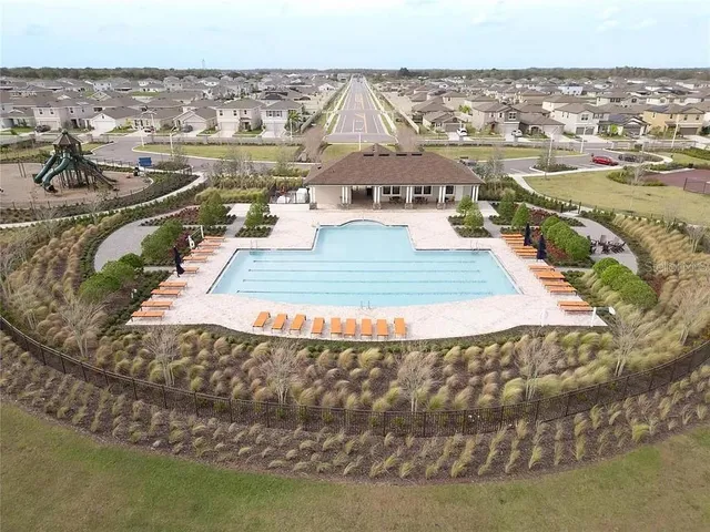 a view of a lake in middle of a city