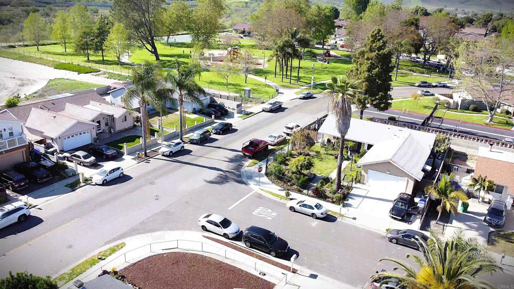 101 Lancer Avenue Oceanside, CA 92058 - Photo 12 of 17 an aerial view of a house with a yard and lake view