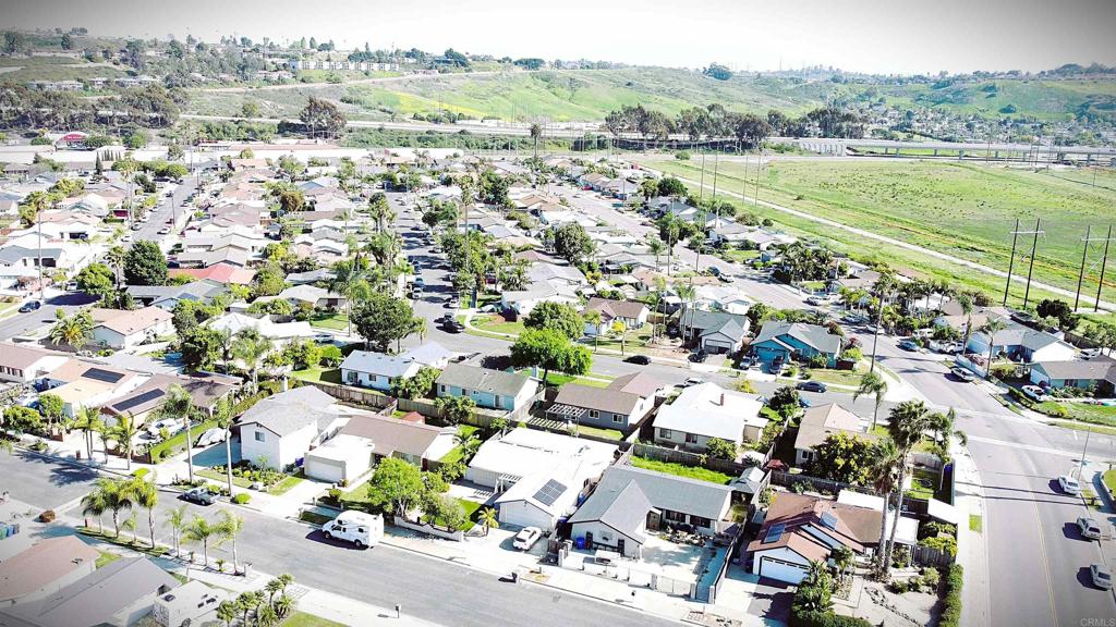 101 Lancer Avenue Oceanside, CA 92058 - Photo 14 of 17 an aerial view of residential houses with outdoor space and ocean view